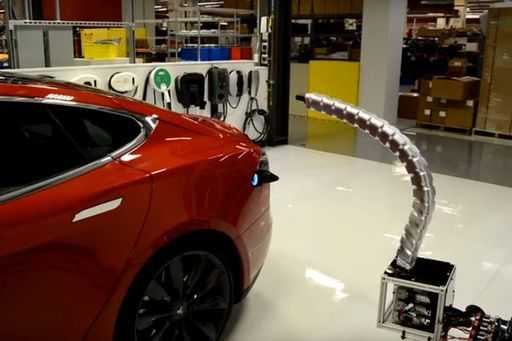 Watch Tesla's creepy robotic metal charging snake automatically attach itself to a Model S