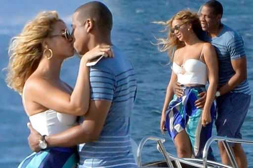 Бейонсе и Jay-Z целуются на романтическом отдыхе, а тем временем  фанаты спекулируют на слухах о беременности Бейонсе