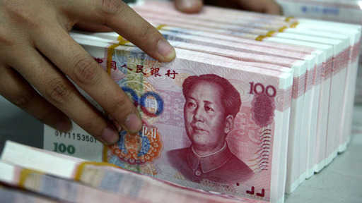 Чим пояснюється девальвація китайської валюти?