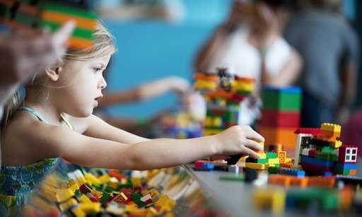 Children should learn mainly through play until age of eight, says Lego