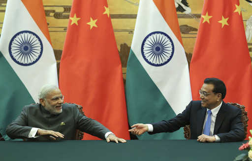 Premier Li mówi, że rozmowy z Modim „spełniają oczekiwania”