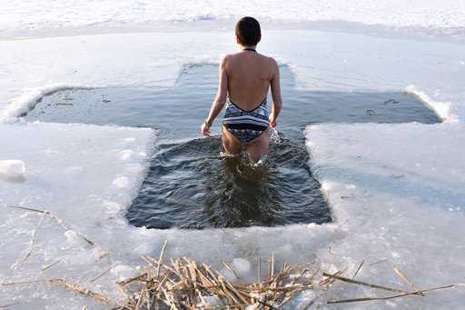 Russia - Priest: Swimming in the hole without visiting the temple loses its meaning
