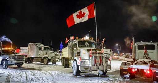 Canada - I manifestanti mantengono il confine di Coutts per il 5° giorno, si dice che blocchi in tutto l'Alberta