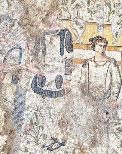 Mozaika przedstawia bankiet na świeżym powietrzu