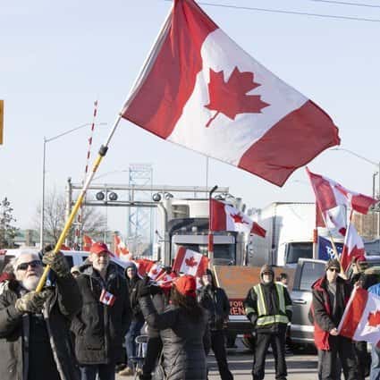 Trudeau je obsodil proteste tovornjakov v Kanadi, medtem ko policija grozi z aretacijami