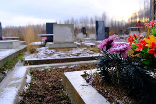 Man arrested for flowers on grave