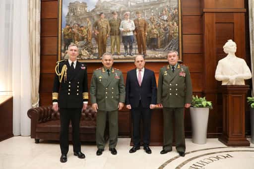 The British were delighted with the picture in the photo of Shoigu and Wallace