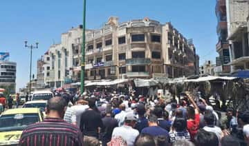 Bližnji vzhod - Več sto ljudi se zbere na redkih protestih na jugu Sirije