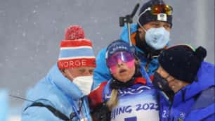 The biathlete completed the Olympics after losing consciousness at the finish line