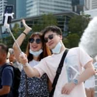 Pod krawężnikami COVID Singapur i Hongkong tracą globalne odbicie w podróżach