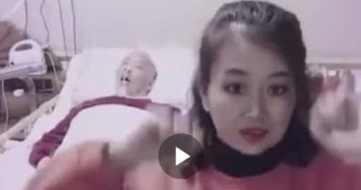 Kinesisk kvinna sprängde för att dansa nära vegetativ make tills historien om kärlek dök upp