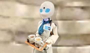 Japońskie serwery robotów umożliwiają pracownikom niepełnosprawnym pracę w kawiarni w Tokio