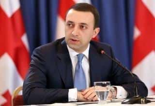 Gruzínsky premiér telefonicky hovoril s eurokomisárom Oliverom Varhelim