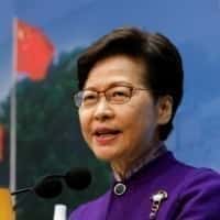 Azië-Pacific - De leider van Hong Kong wordt stil terwijl de COVID-19-crisis in de stad erger wordt