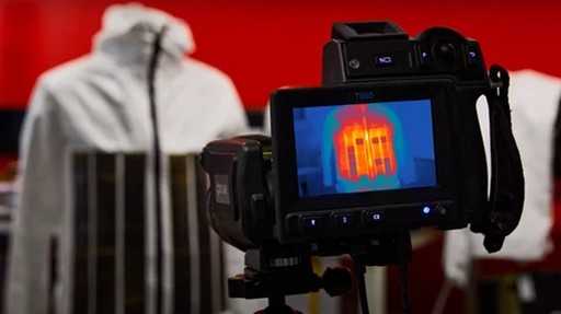 Engineers have created a jacket that makes the wearer invisible in the infrared
